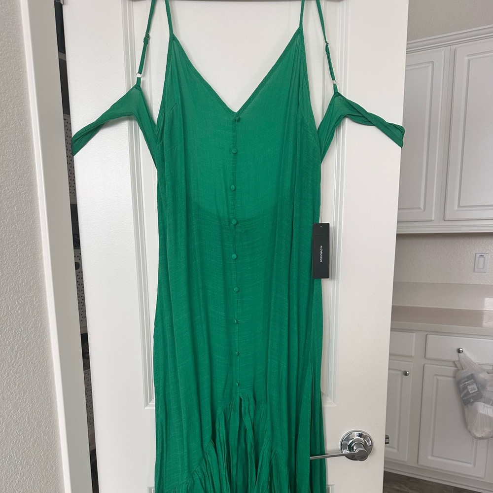NWT. Beautiful high low dress. Perfect for spring/summer.